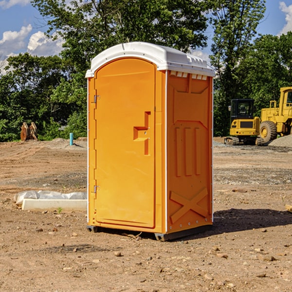 what is the cost difference between standard and deluxe portable restroom rentals in Angelica